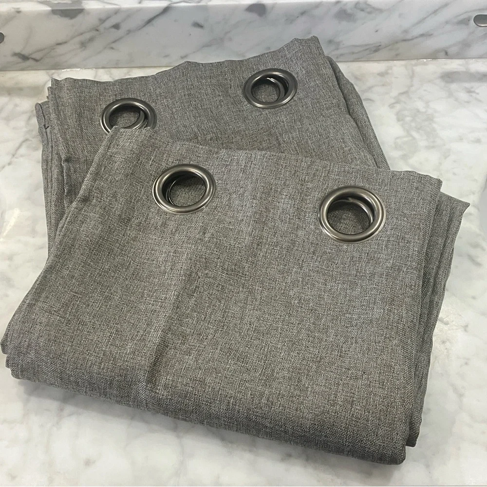 Set of 2 Grey window Curtains about 3ft by 7 ft with grommets.  rod hanging